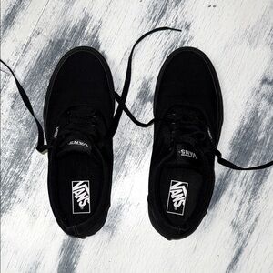 All black women’s vans authentic skate shoes. Size 10 in women’s and 8 in men’s.